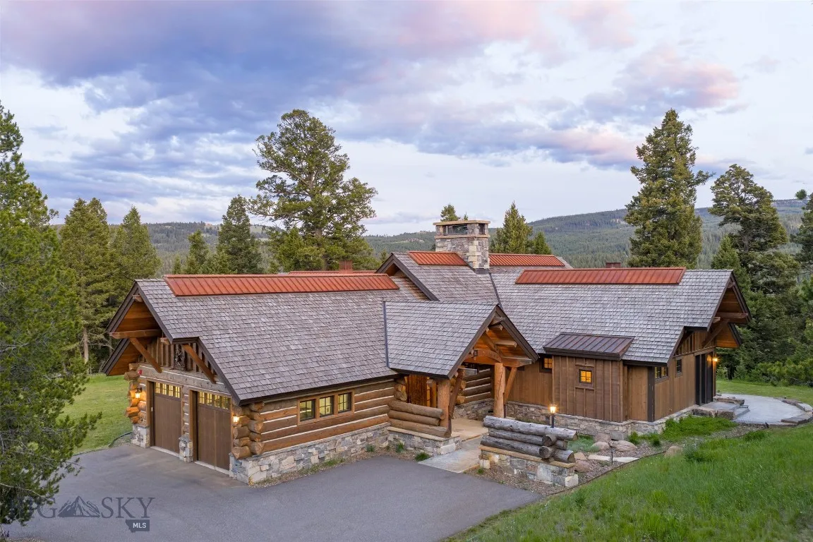 Experience the ultimate in mountain living with this beautifully crafted log home