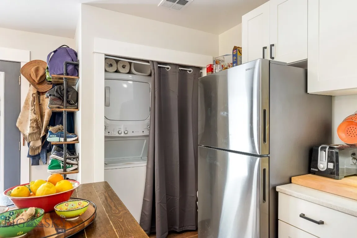 Stacked washer and dryer in ADU.