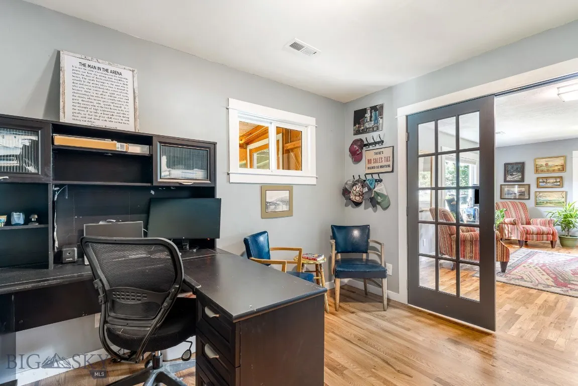 Office off of main living area with french doors.