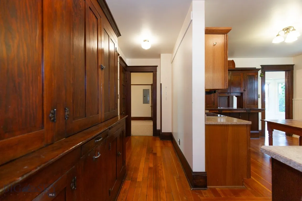 Original Kitchen Cabinets for added storage in Hallway