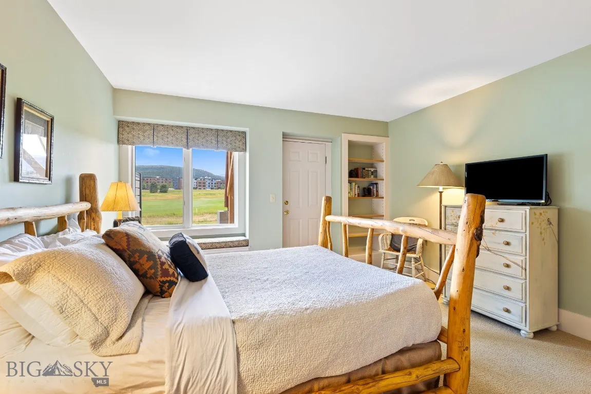 Guest bed 1 with back patio/hot tub access