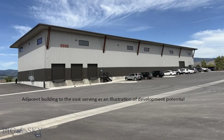 Adjacent building to the east serving as an illustration of development potential