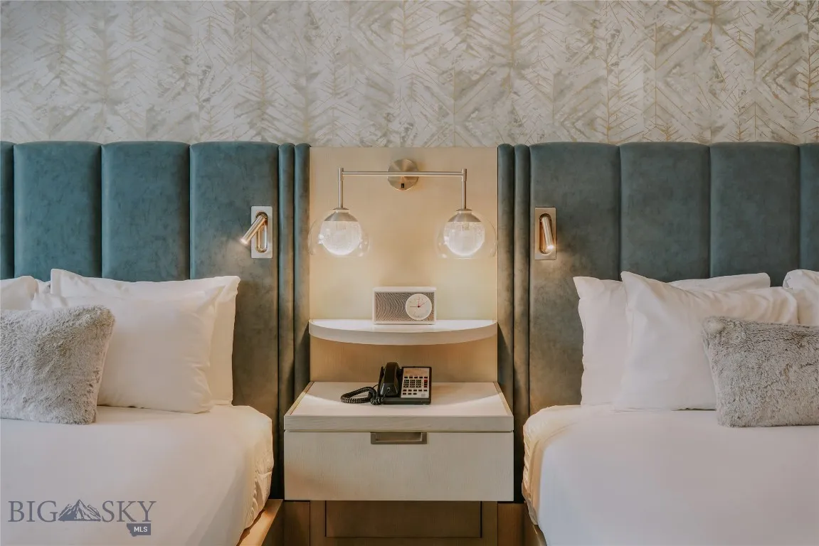 Elegant upholstered headboards and ambient lighting