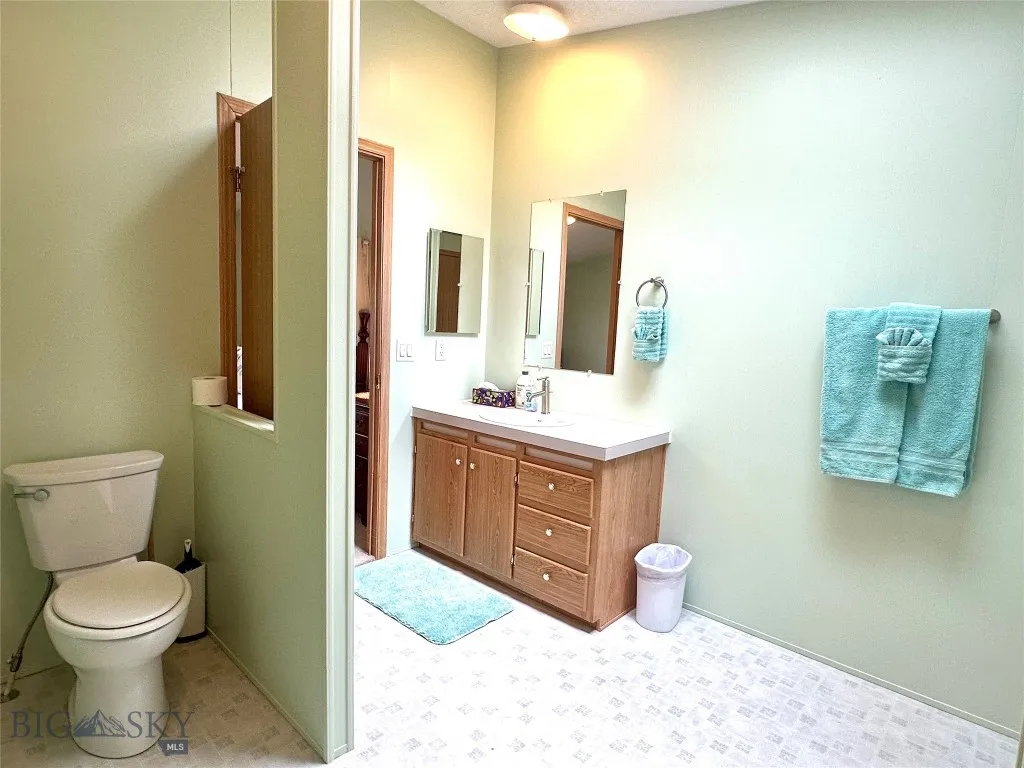 Bathroom from Primary & Laundry