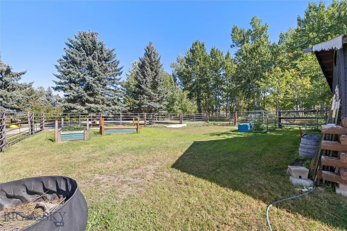 Fenced garden area off barn