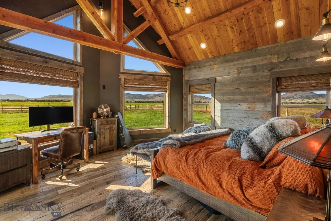 Primary Bedroom looking out over large acreage.