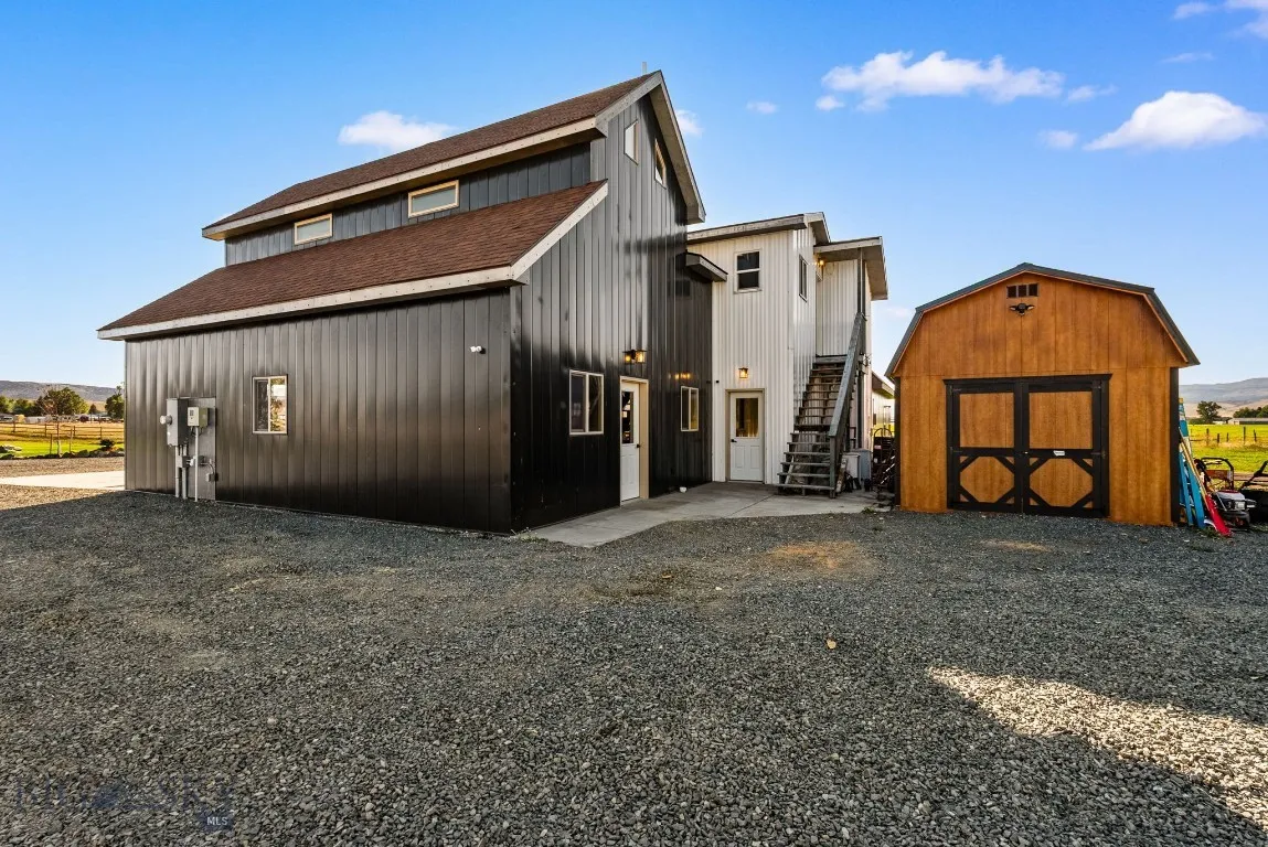 North side of house with separate exterior entry to bedroom