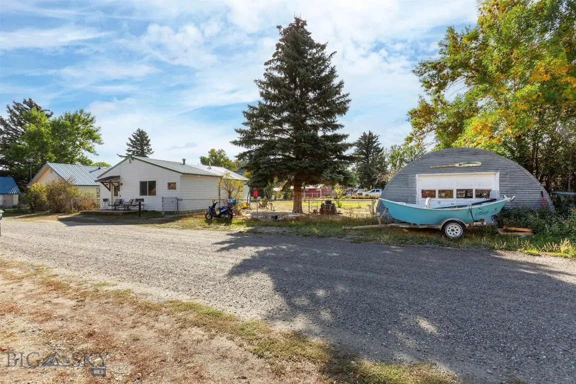 Garage and boat on adjacent lot and not included