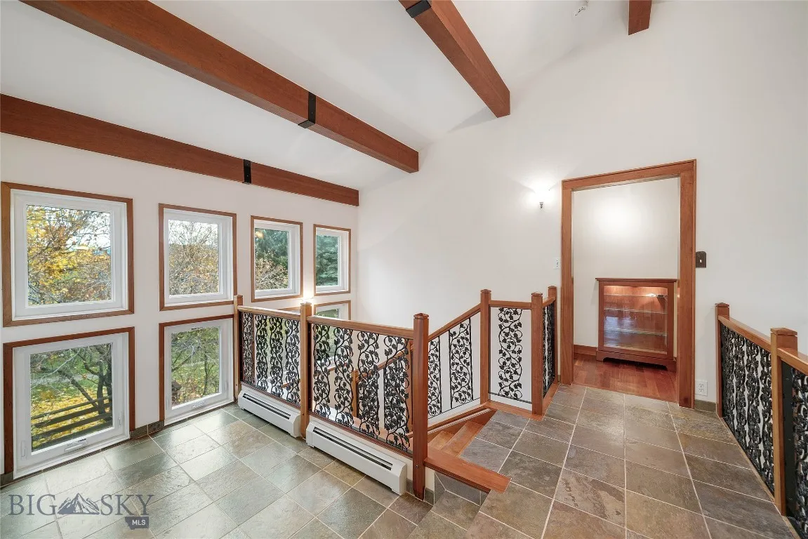 upper foyer, sitting area
 (north side); facing built-in lighted cabinet