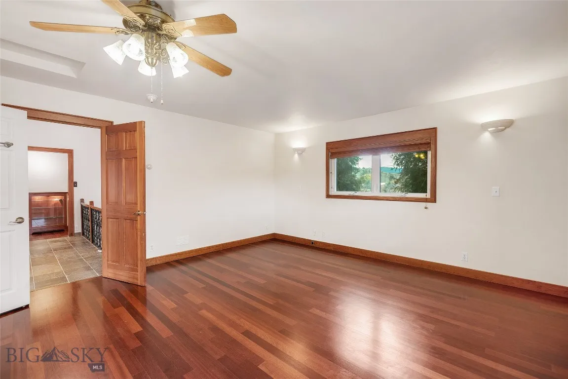 master bedroom: south window; door back to atrium