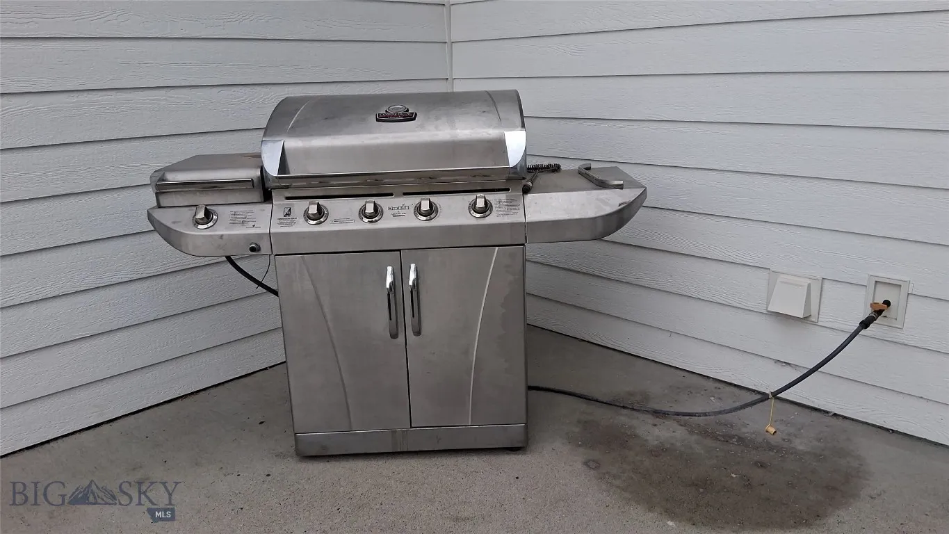 natural gas grill on the patio; hooked up, included