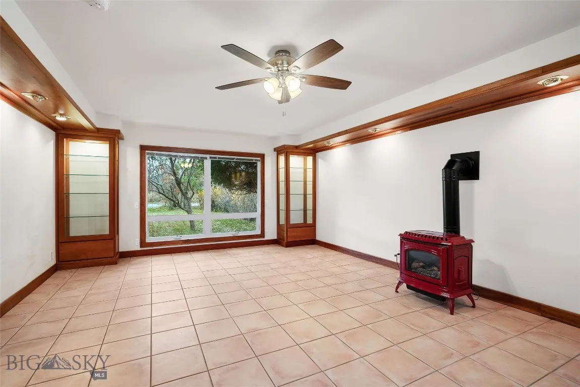 heated tile floor: 2 thermostats (1 for floor, 1 for red gas stove)