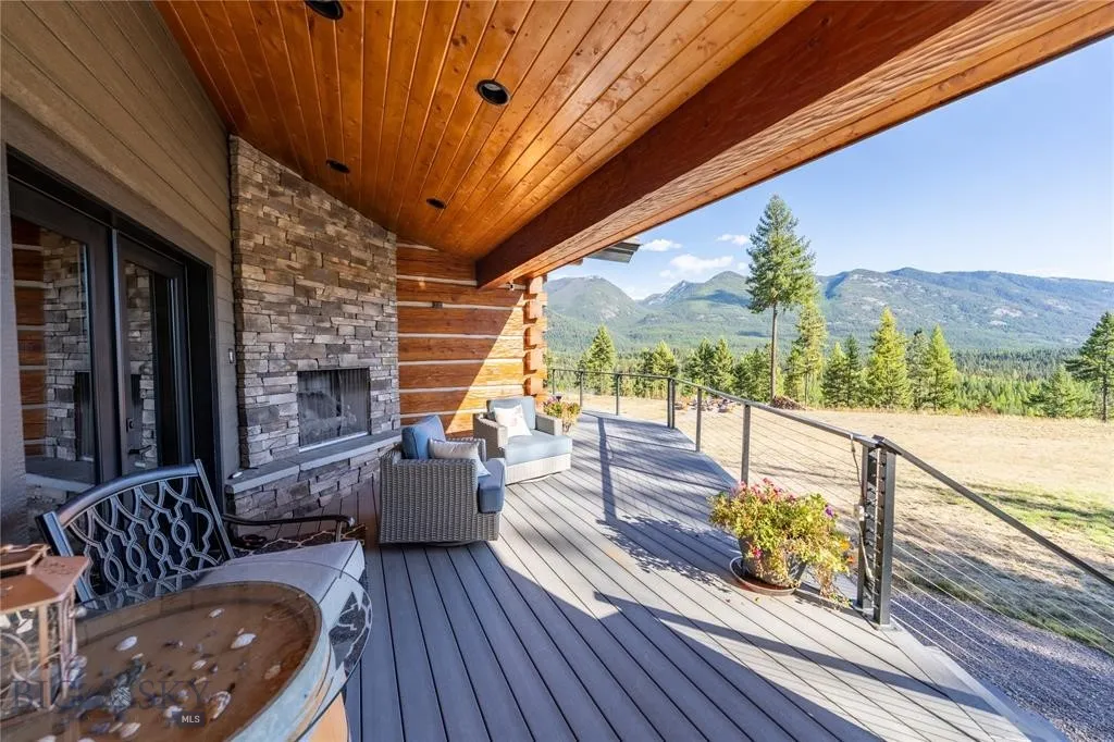 Deck off of Ensuite with fireplace and hot tub