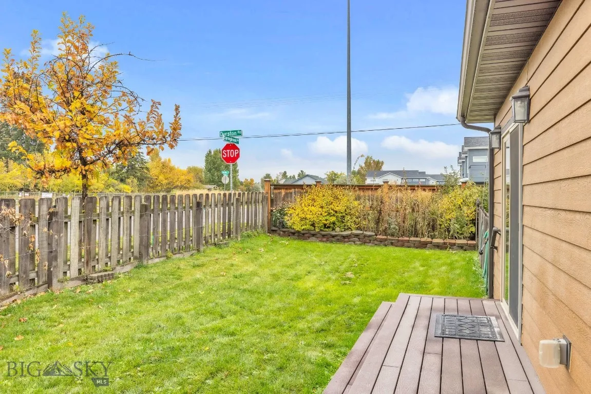 1 of 3 fenced areas in backyard