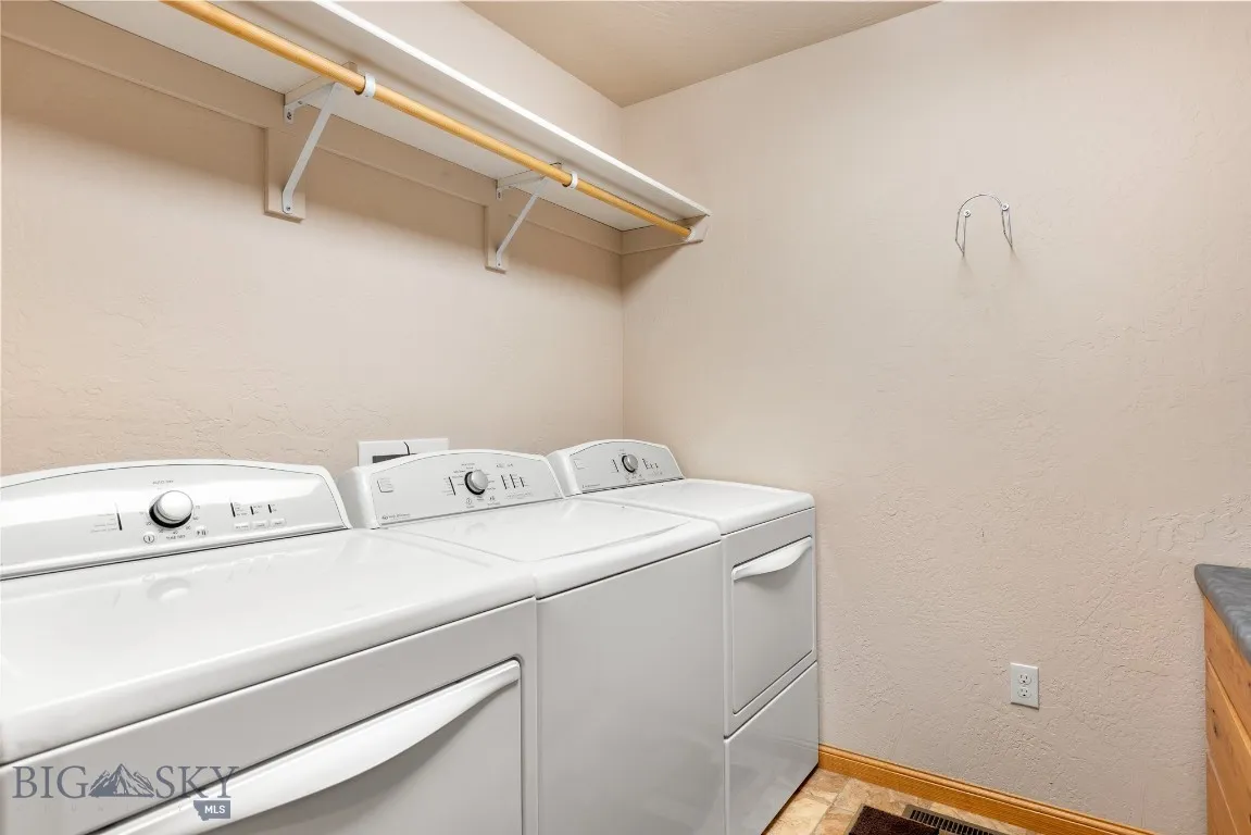 One washer and two dryers (all convey with the home)