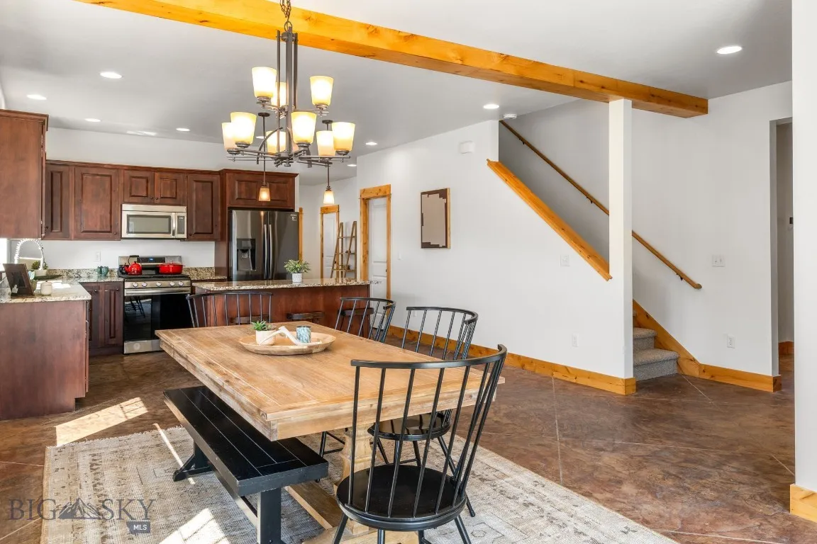 Dining area to hall to primary bedroom, laundry and powder room