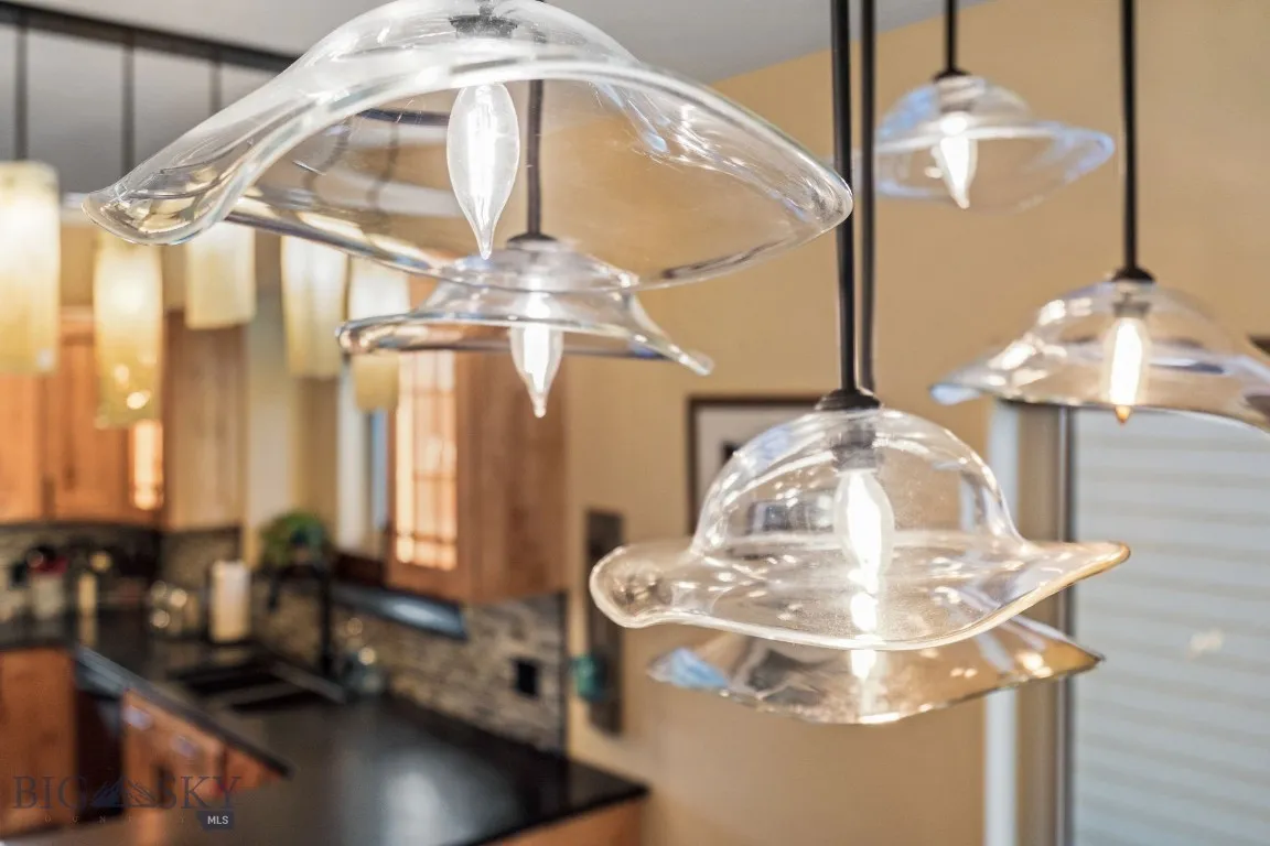 Handblown glass custom lighting over dining table
