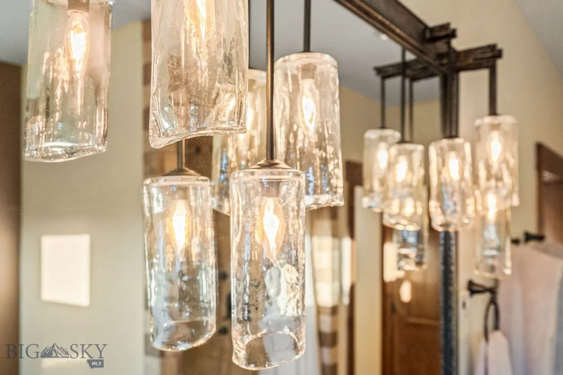 Handblown glass custom lighting in primary bath