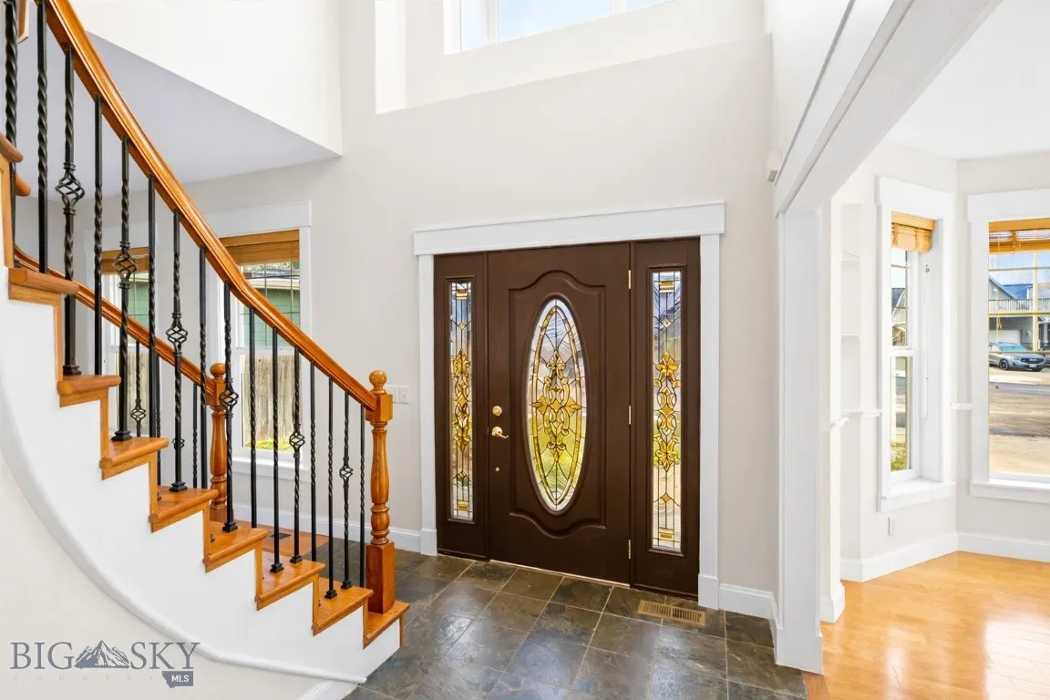 stairs guide you up to a versatile loft space