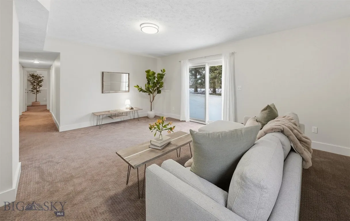 To the laundry room and guest bedrooms, bath