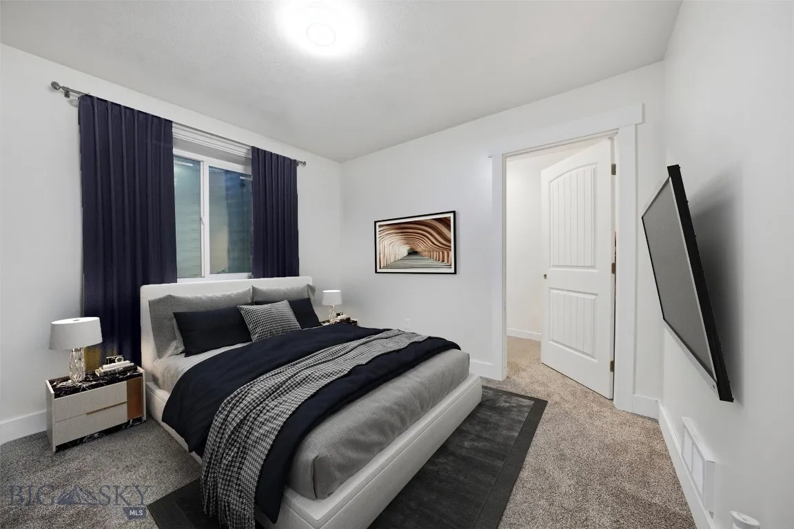Basement bedroom 1. This image has been virtually staged. Furniture and décor shown are for illustrative purposes only and do not convey.