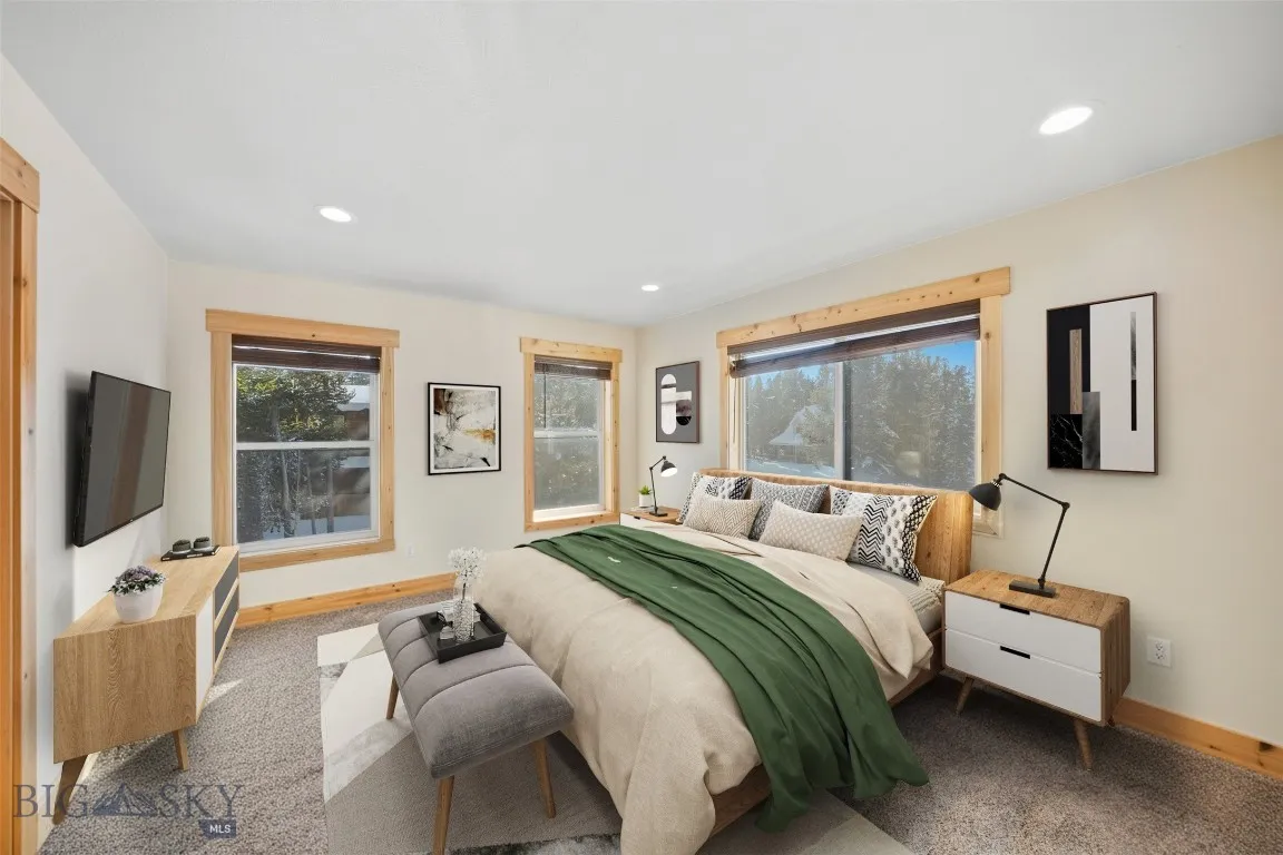 Upstairs bedroom 1.This image has been virtually staged. Furniture and decor shown for illustrative purposes only and do not convey.