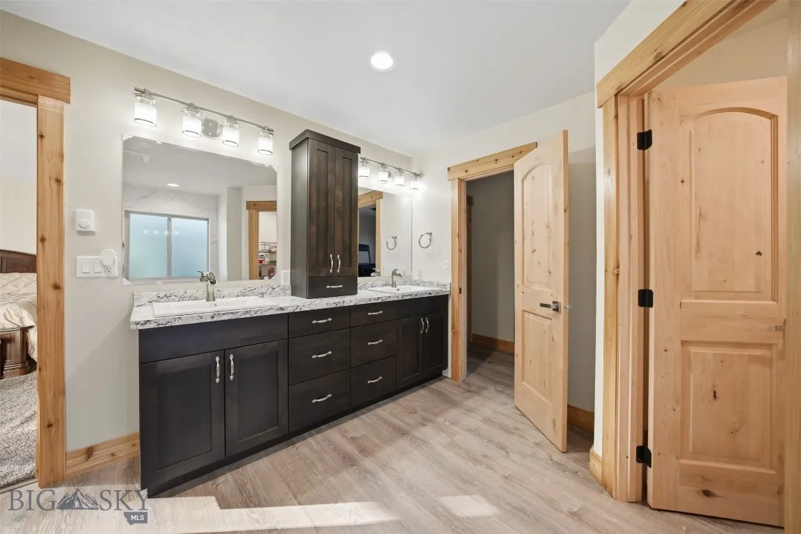Attached primary bathroom with walk in closet.