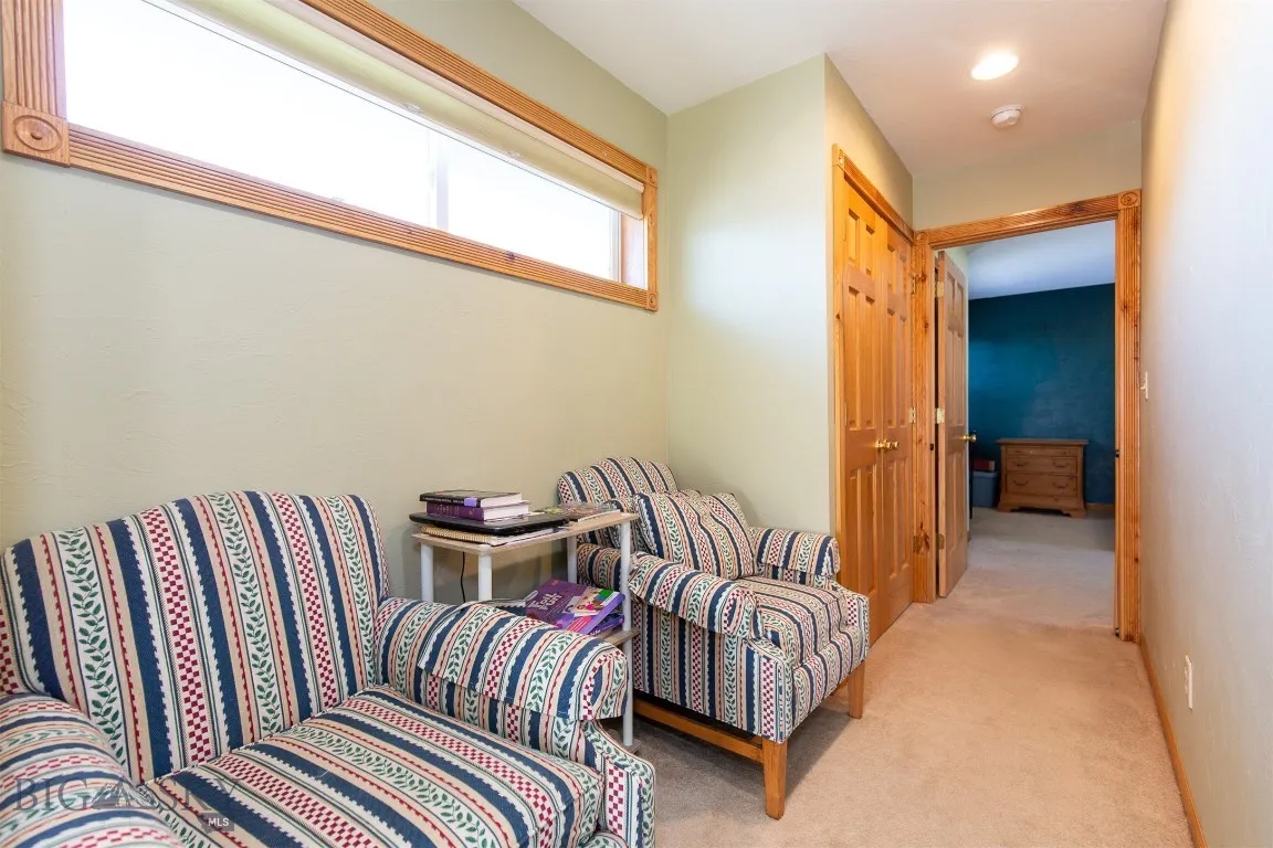 Upstairs Hallway with options for Seating, Desk, or more Storage & Extra Closet Storage