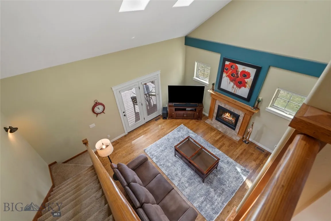 Stairs and landing open to living room below