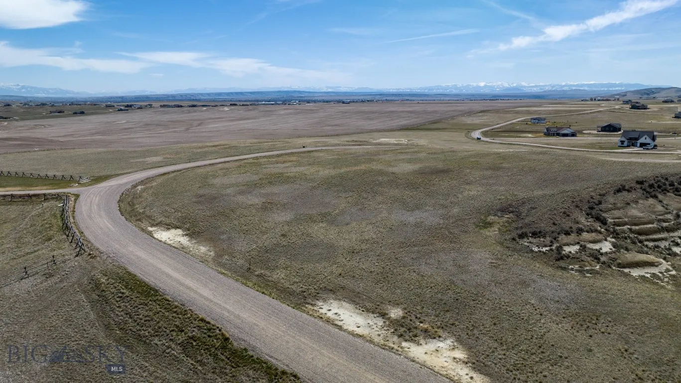 Park space on the right hand side. Lot is on the left. This view to the Southeast towards the Gallatin Range and the Spanish Peaks.