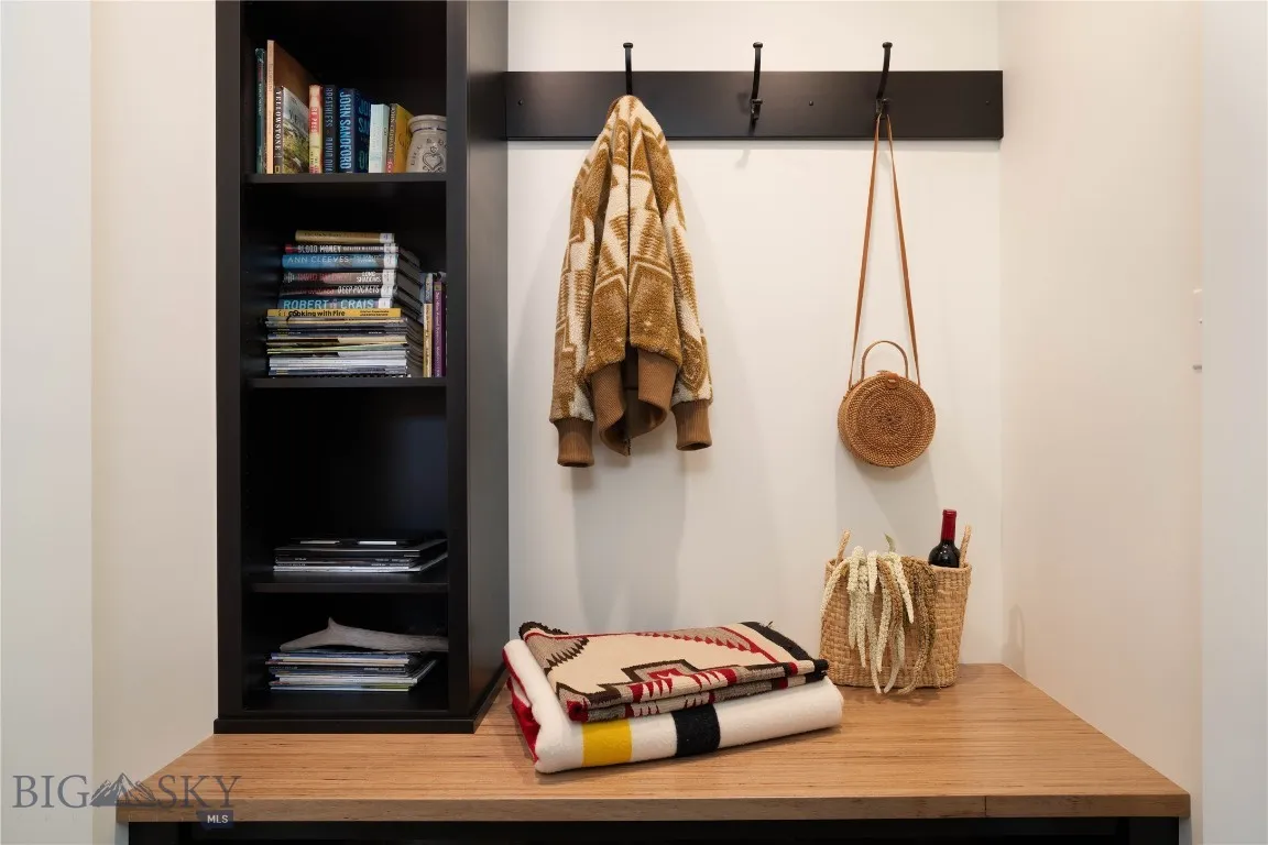 Custom built-ins for coats and a bench for kicking off your boots after a day outdoors.