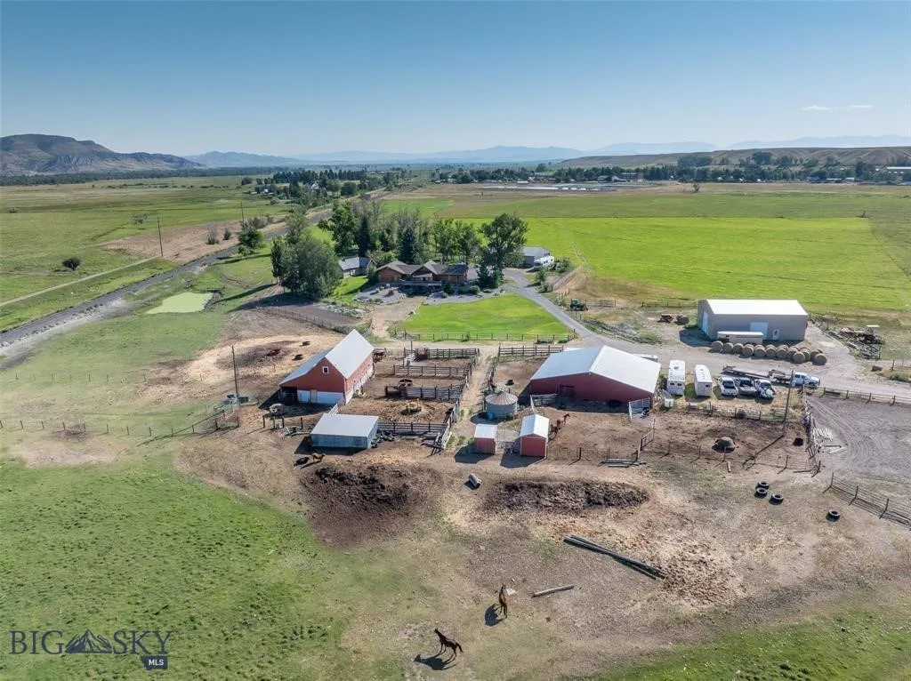 Aerial view of the barn yard and corrals looking east
