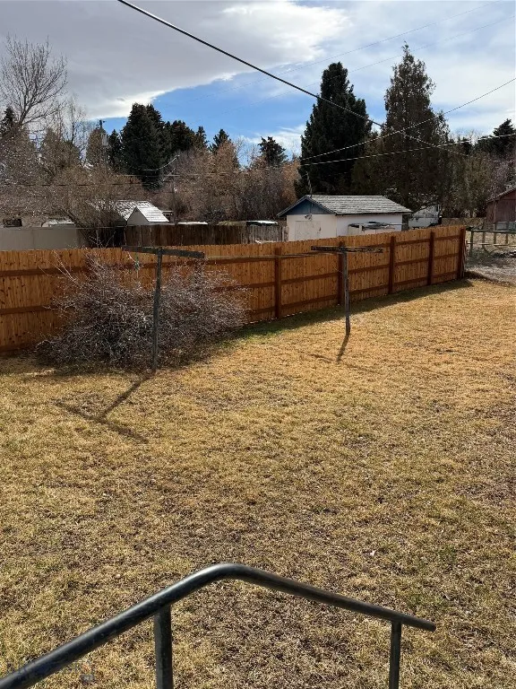 Back yard,  underground sprinklers and new cedar privacy fence