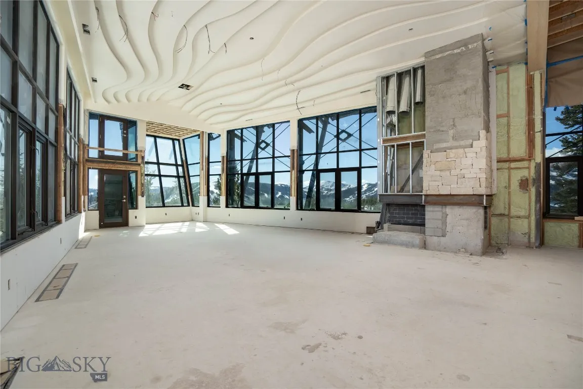Main living area with stone fireplace