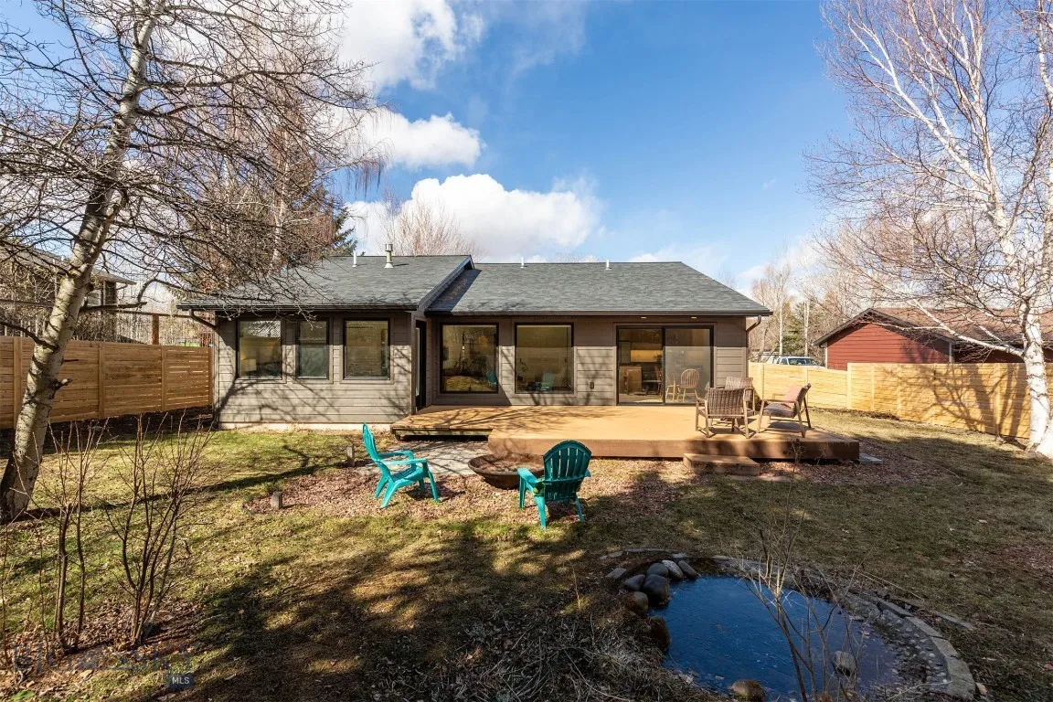 Open backyard with mature plantings
