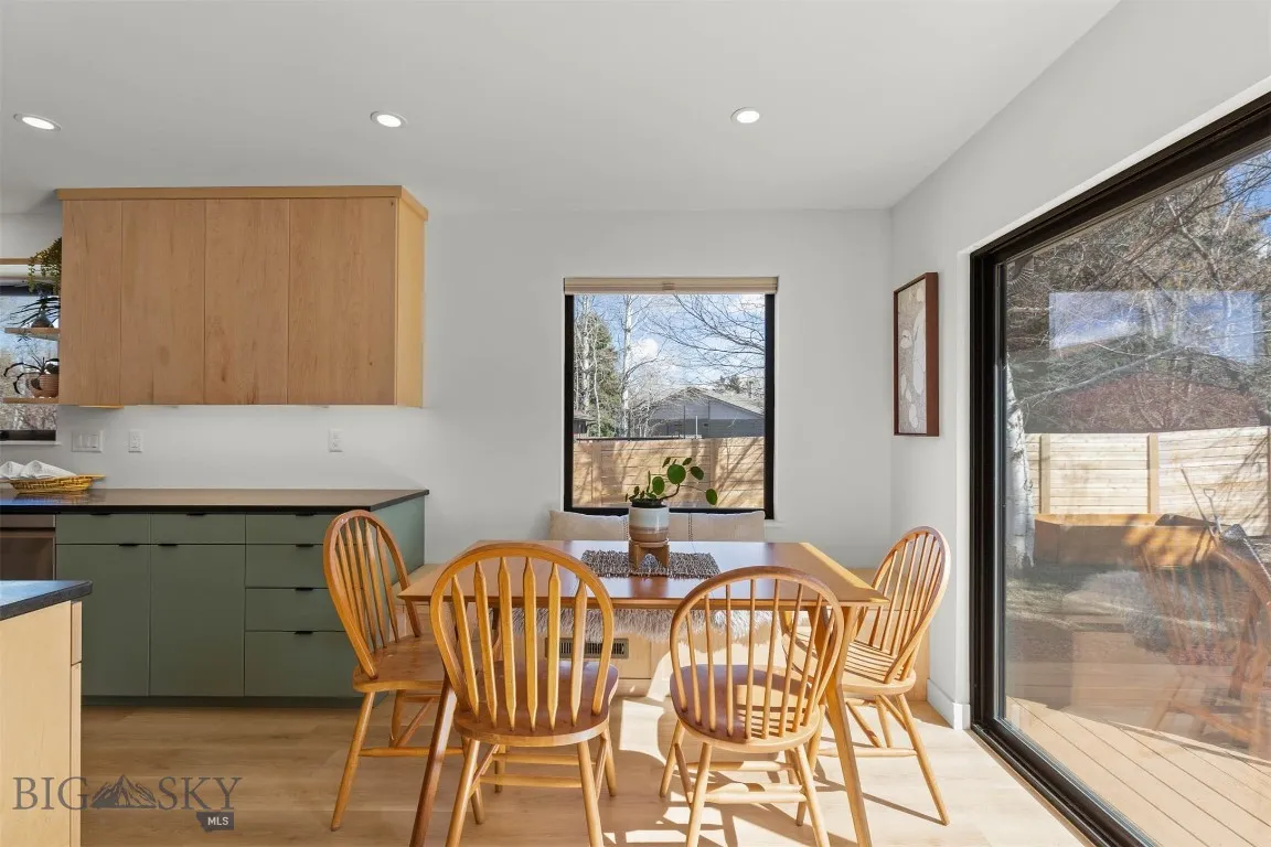Sunny dining area next to back deck