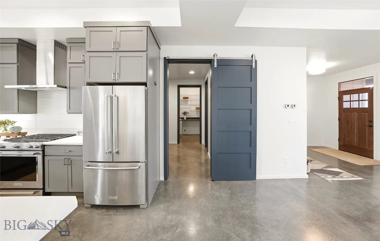 To the Mudroom and Laundry Room and Huge Walk-in Pantry