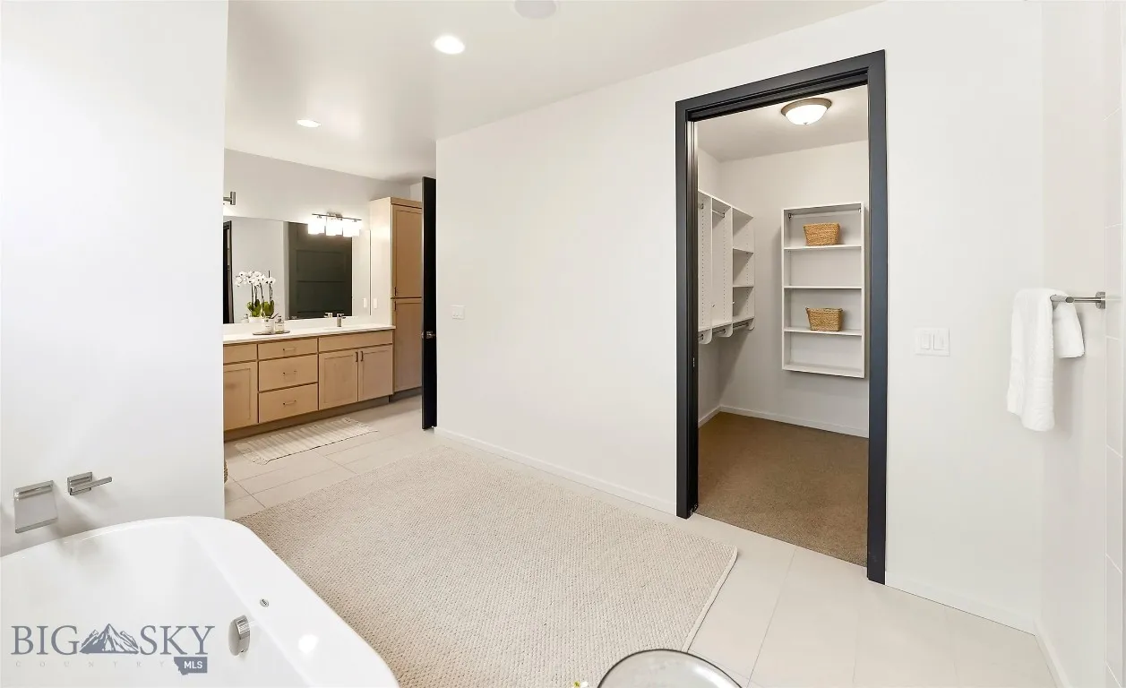 Gigantic Primary Luxury Bathroom and Her Closet