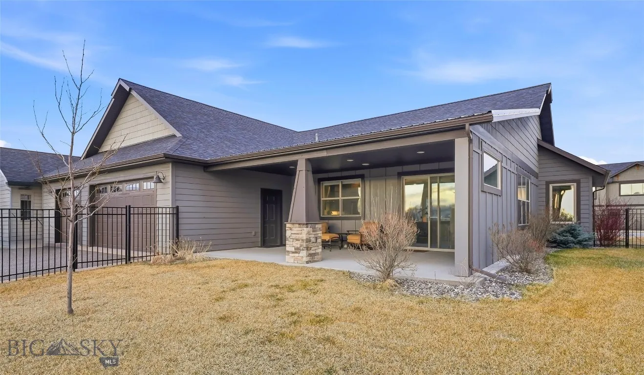 Covered back patio with gas hookups, fenced and landscaped yard
