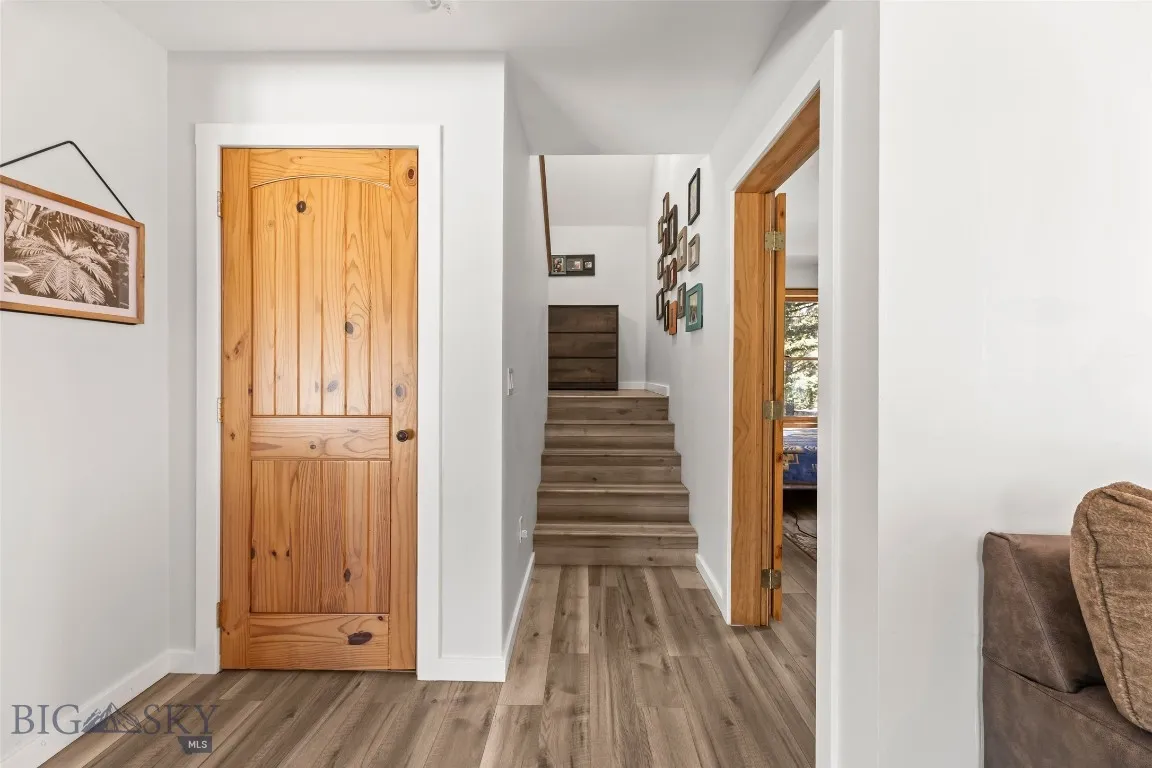 Coat closet and staircase to second floor