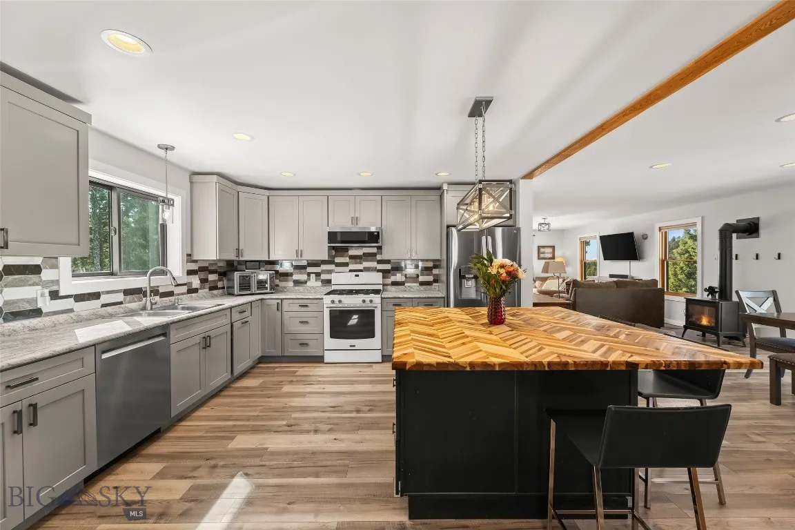 Custom kitchen with ample cabinet space and large island