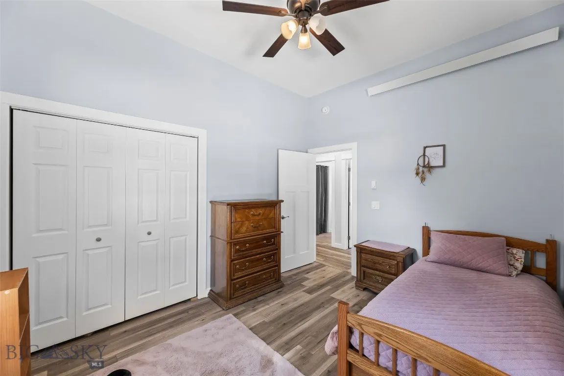 Bedroom #5 with large closet, ceiling fan and 10 foot ceilings