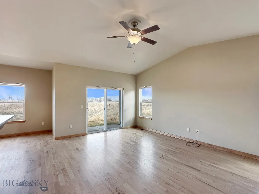Living Room Exit to Open Space behind Condo