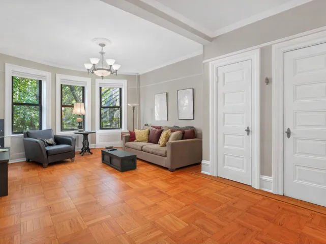 Living room with table and floor rug removed