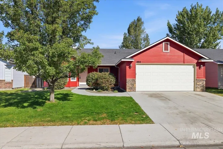 Red exterior siding with stone accents