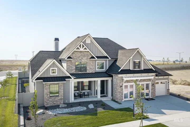 Multifaceted exterior with stone and siding accents
