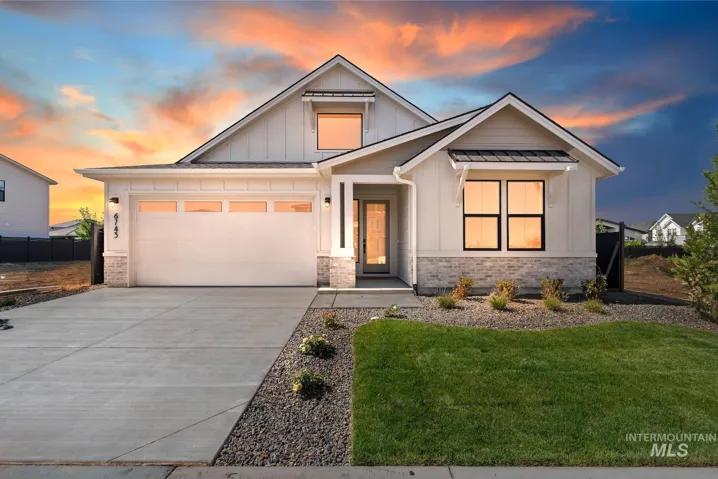 Contemporary exterior with board and batten siding and stone accents