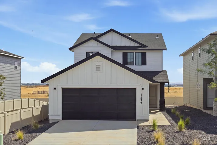 Two-story residence featuring a black asphalt shingle roof, white board and batten siding, and dark-colored shutters