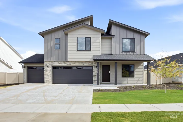 Modern architectural exterior with varied siding textures and stone accents