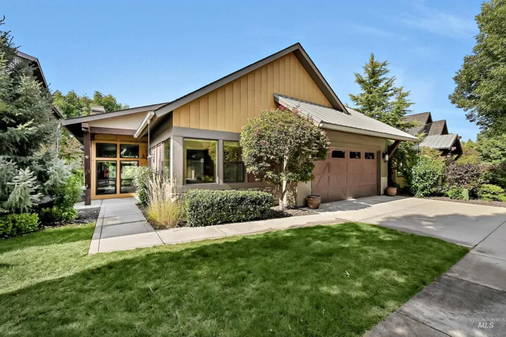 Modern architectural design with a metal roof and wood siding